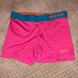Nike Pro fitted  work out shorts in pink